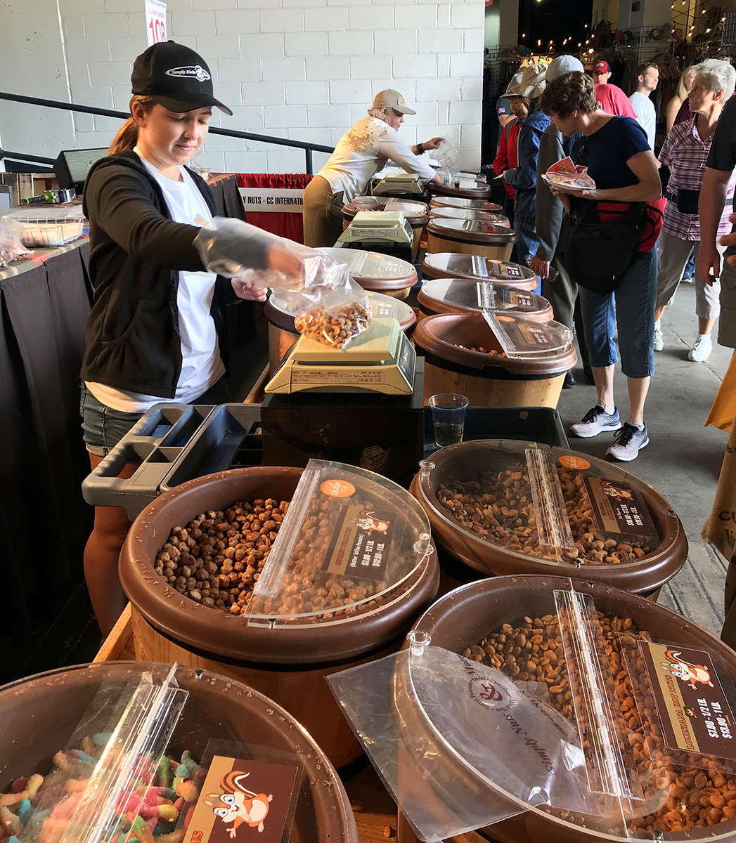 serving up nuts at the Simply Nuts booth at the MN State Fair